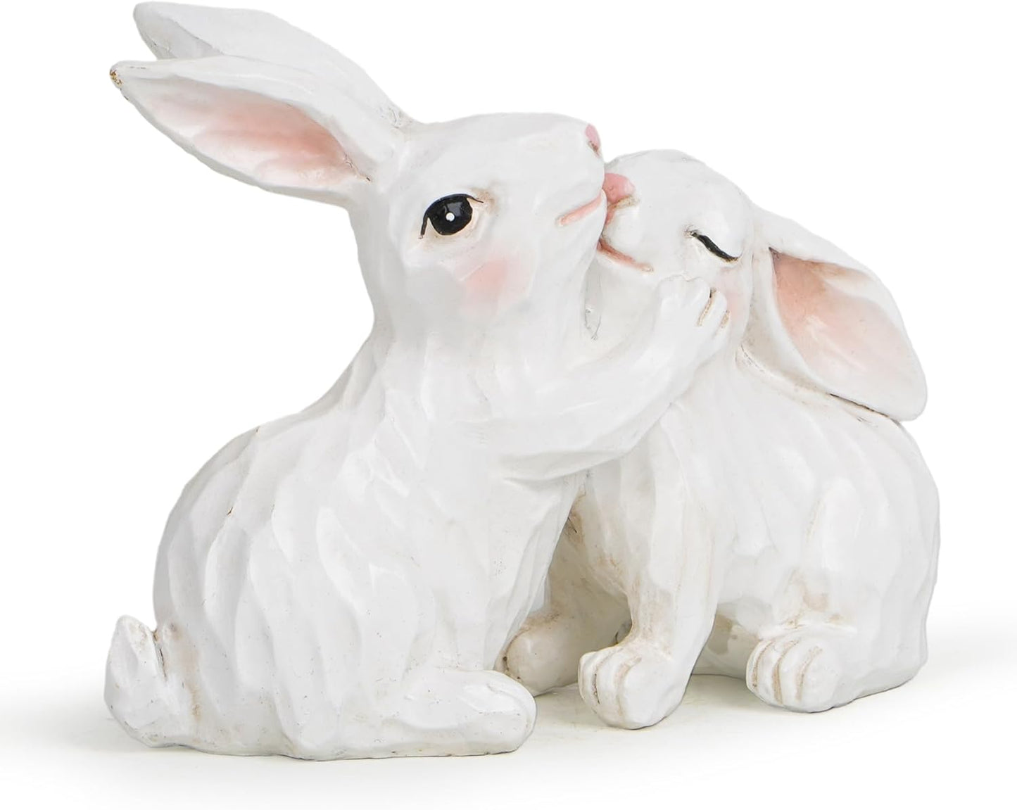 White ceramic rabbit figurine on a white background