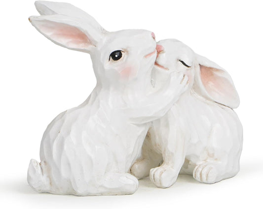 White ceramic rabbit figurine on a white background